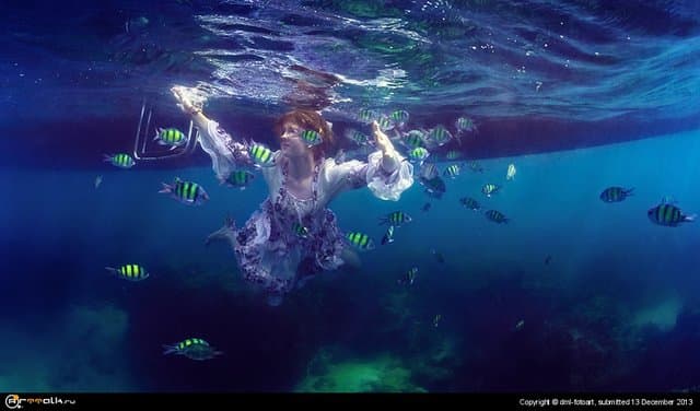 Girl And Fish.